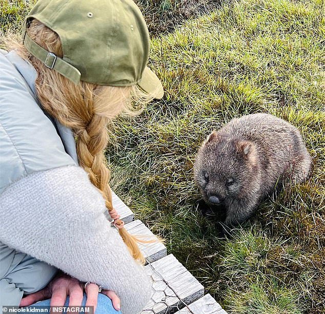 In one photo, the Oscar-winning actress leaned down to inspect the wildlife.
