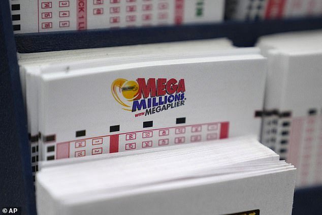 The Mega Millions game (pictured) will be drawn in the US on Tuesday at 11pm EST (Wednesday, 3pm AEDT)