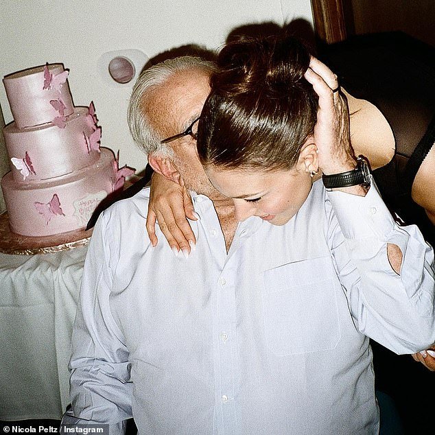 Doting daughter: Father Nelson, 80, planted a kiss on Nicola's cheek