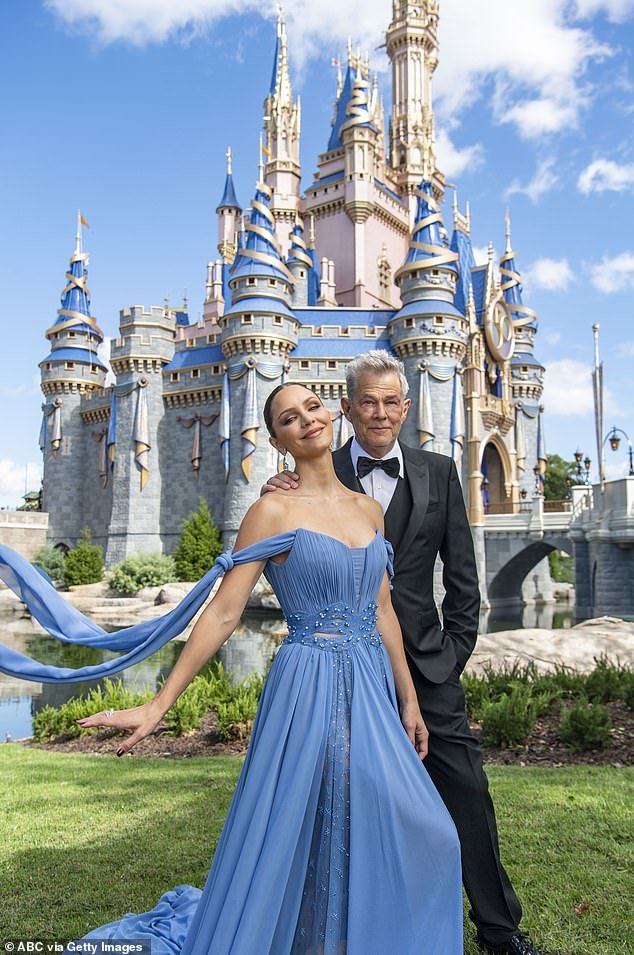 Fitting: Katharine and David, who have collaborated on a new Christmas album together, were recently featured posing for Disney in the Happiest Place on Earth.