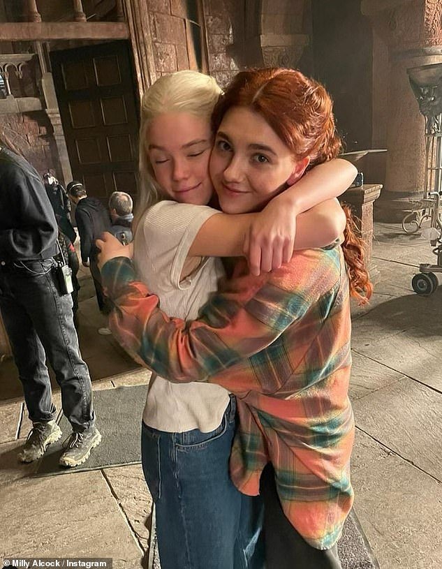 Big move: Milly moved to the UK in early 2021, amid the pandemic to start filming for the HBO series, befriending her co-stars in a city where she hardly knew anyone (pictured) on set with co-star Emily Carey)