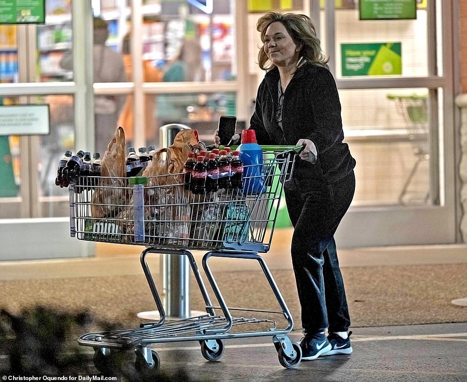 Julie filled her shopping cart at a Publix with sodas, snacks and laundry detergent, even though she is due to report to prison tomorrow to serve a seven-year sentence.