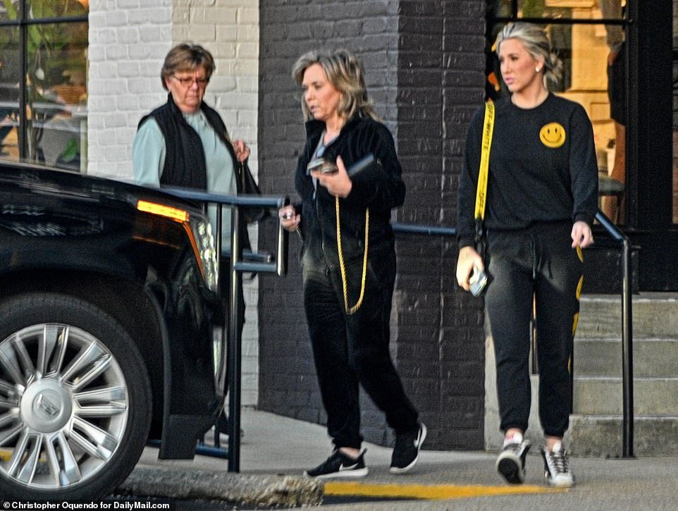 Savannah wore a fun matching black tracksuit, with yellow smiley faces all over it, while Pam wore a black vest over a light blue sweater.