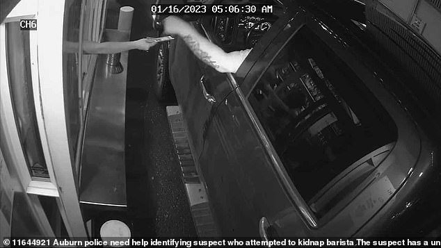 The barista is on scene handing the cash back to the suspect before he breaks the zip ties and tries to drag her through the drive-thru window.