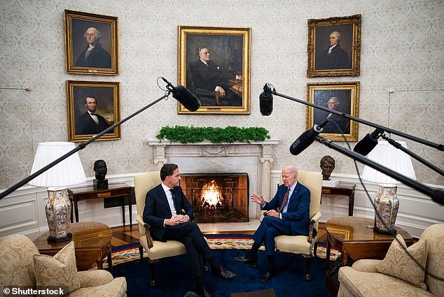 On Tuesday, as Biden sat in the Oval Office next to the Dutch Prime Minister (above, left) the smirker-in-chief pressed his lips together, shrugged to his foreign visitor and chuckled as if these journalists were just pesky children.