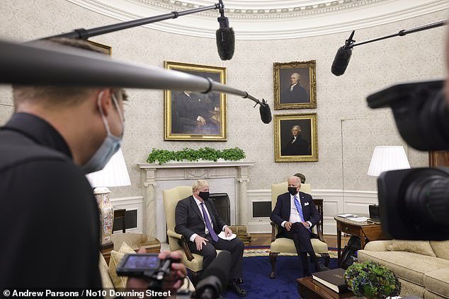 When British Prime Minister Boris Johnson (above, left) visited the White House last year, he took questions. Biden just sat there, as he does, arms folded, hands clasped or on his chin.