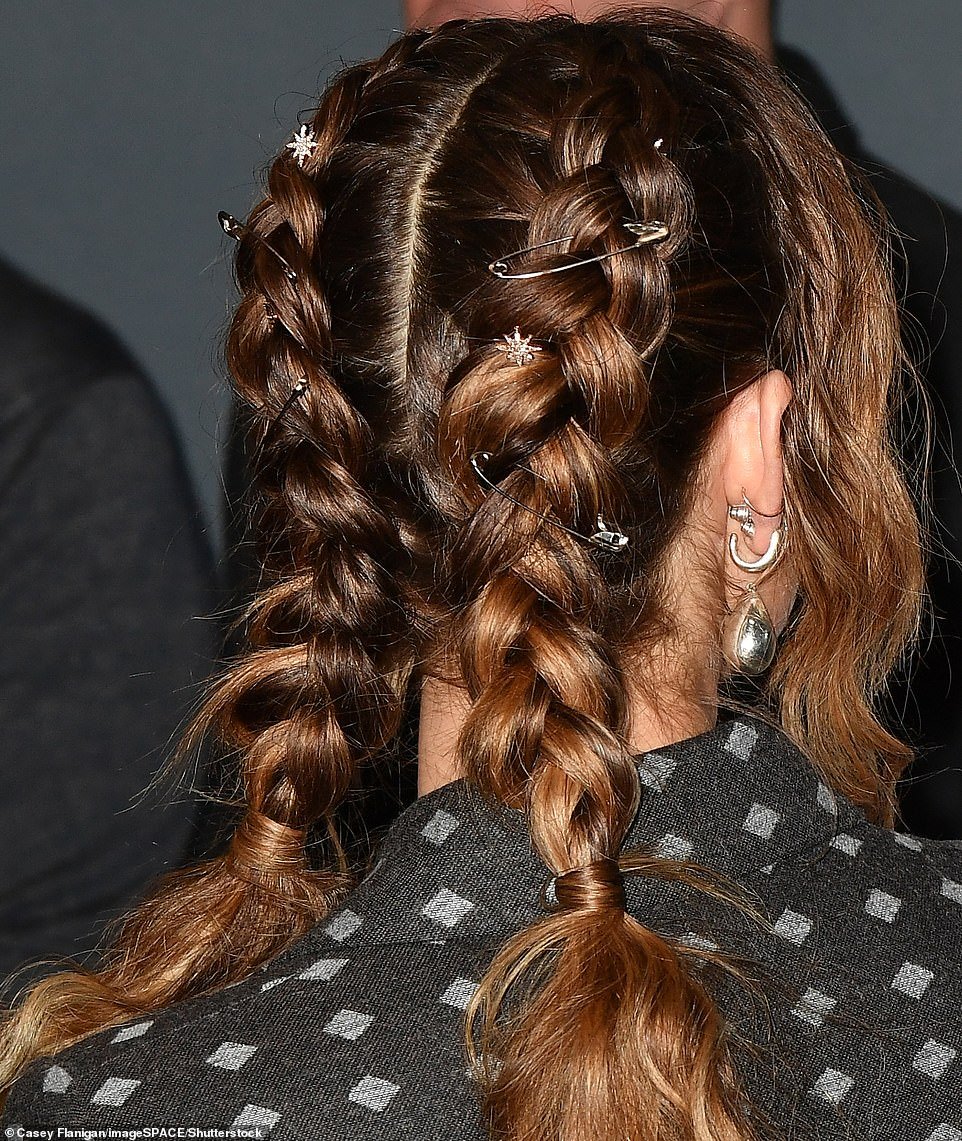 Pretty Braids: Debby had her fringed ombré waves styled into two back braids, which were entwined with safety pins and rhinestone stars