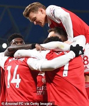 Arsenal celebrate their thrilling 3-2 win against Man United