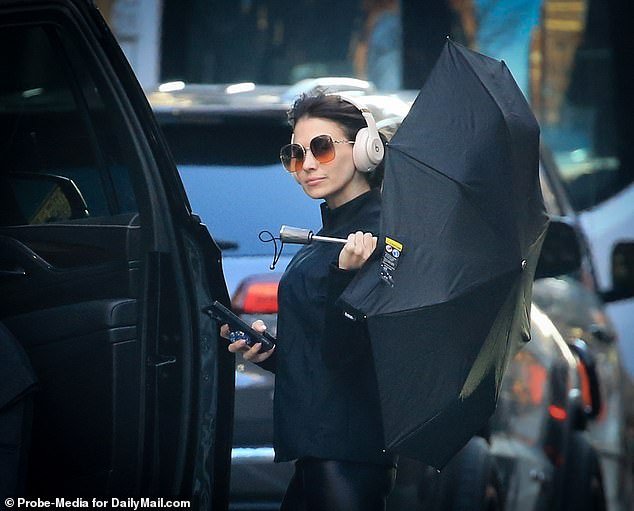 Hilaria, however, seemed more nonchalant, posing for photos while armed with an umbrella, apparently to block out the sun seen during an unusually warm day in New York.