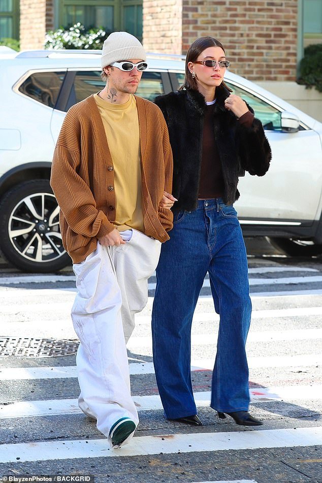 Looking good!  Just three days after revealing her new blunt bob haircut, the 26-year-old model looked happy and in love with her as she strolled down the sidewalk in New York City.