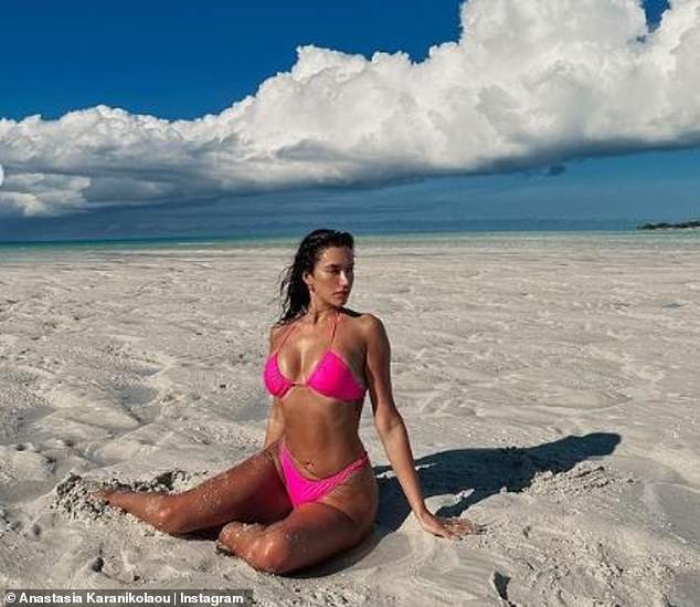 Toned: The model showed off her firm abs and toned legs while enjoying the beach in Turks and Caicos on Sunday