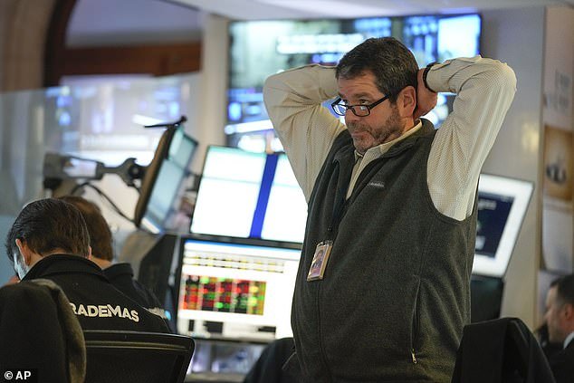 A trader is seen during the glitch that caused the New York Stock Exchange to go out on Tuesday morning.
