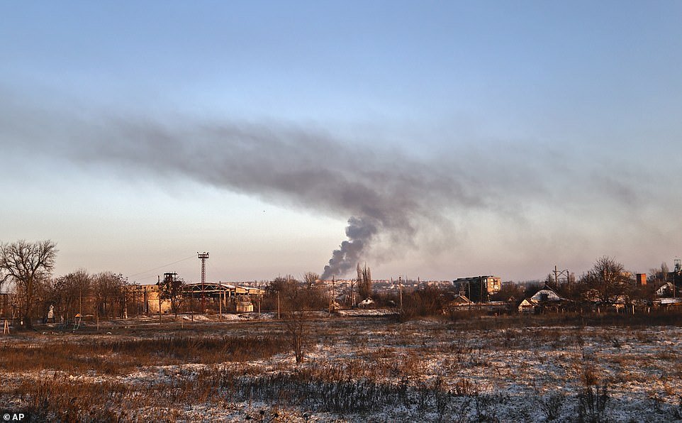 Smoke rises after shelling in the town of Soledar, the site of heavy battles with Russian forces in the Donetsk region, Ukraine