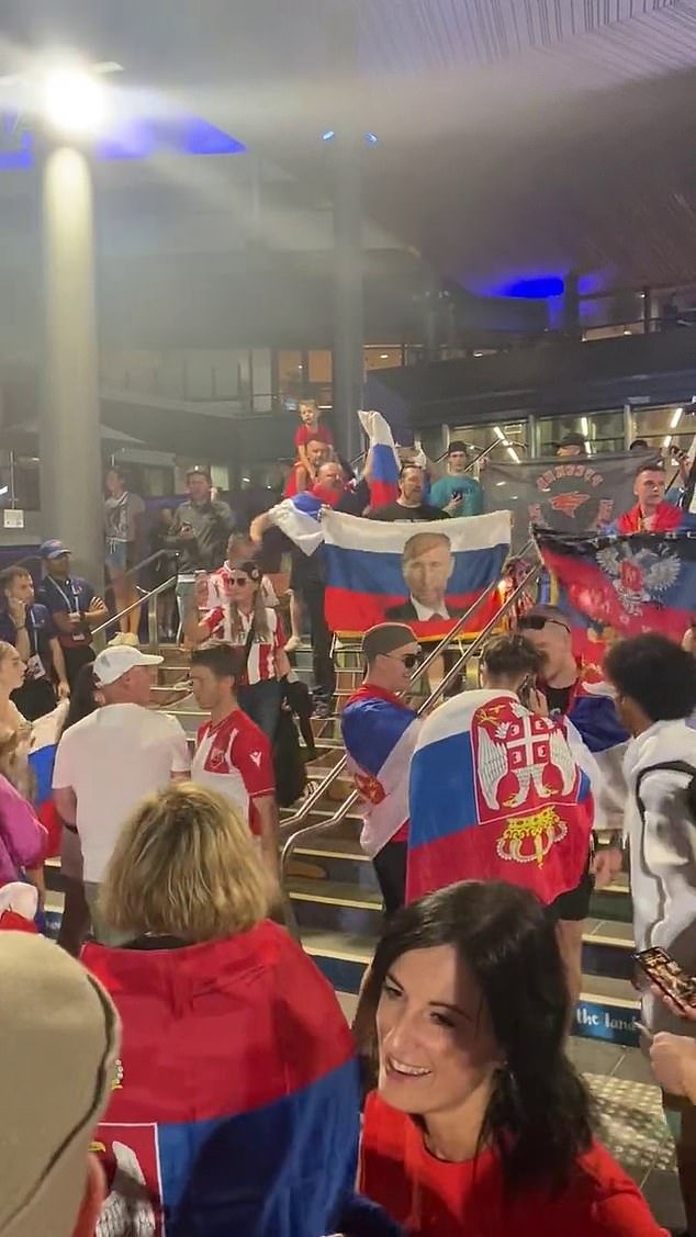Fans brandished a flag with Putin's face on it and sang Russian war songs in Melbourne.