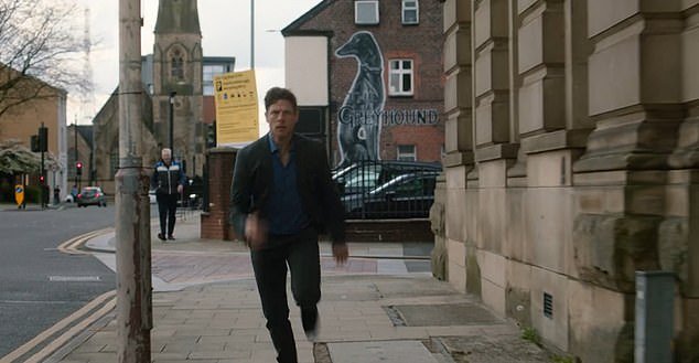 Location: Tommy is seen running from the courtroom after his escape through the streets of Leeds.