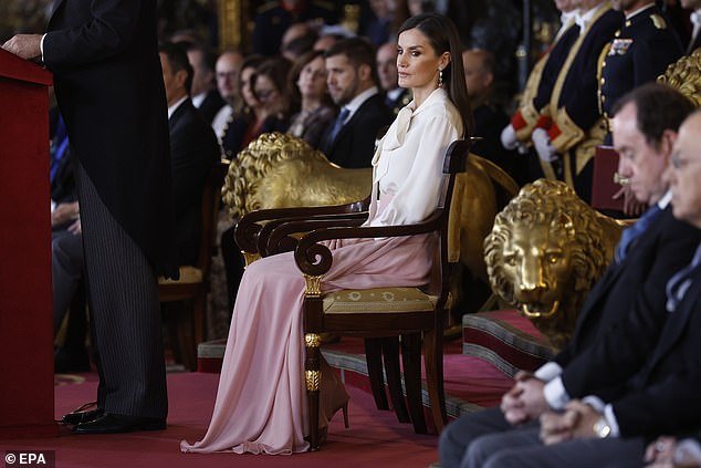 Queen Letizia seated as her husband King Felipe delivers a speech to diplomatic delegates