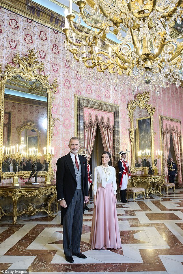 Photos of the monarch of Spain and his wife attending the reception show the grandeur of the Royal Palace of Madrid