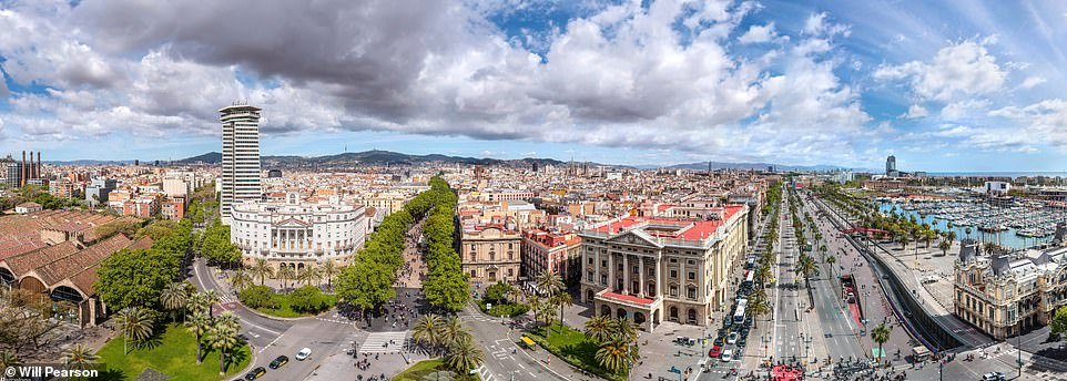 Interactive images are made up of hundreds of photos stitched together to create a single image that contains a staggering four billion pixels.  Above is a static version of the Barcelona photo.
