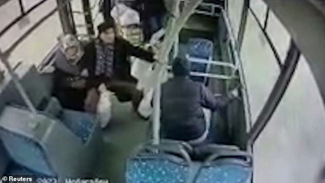 In the middle of the bus, passengers were visibly shaken and could be seen asking each other what was going on