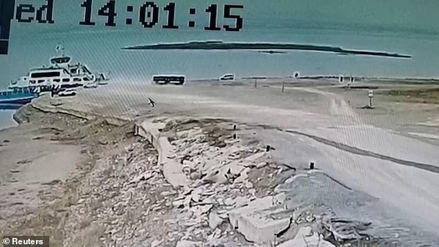 Footage overlooking the dock showed that the driver lost control when maneuvering the vehicle next to the lake