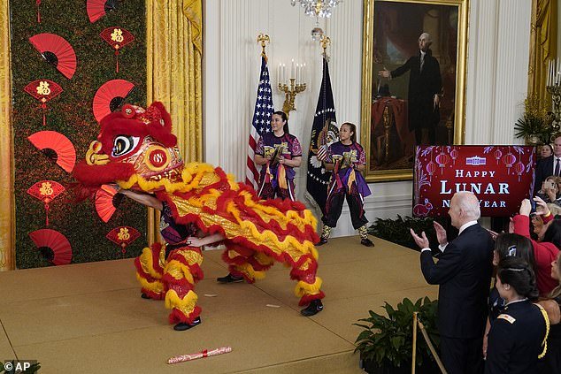 President Joe Biden stood front row to watch the dragon dance, after boasting that his White House was the first to host a Lunar New Year event 