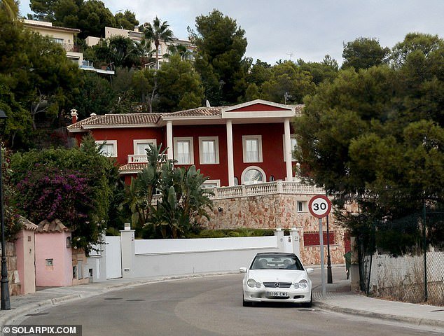 Holmes Cameron was arrested at a luxury villa in Bendinat, near the glamorous Mallorcan port of Puerto Portals (pictured)
