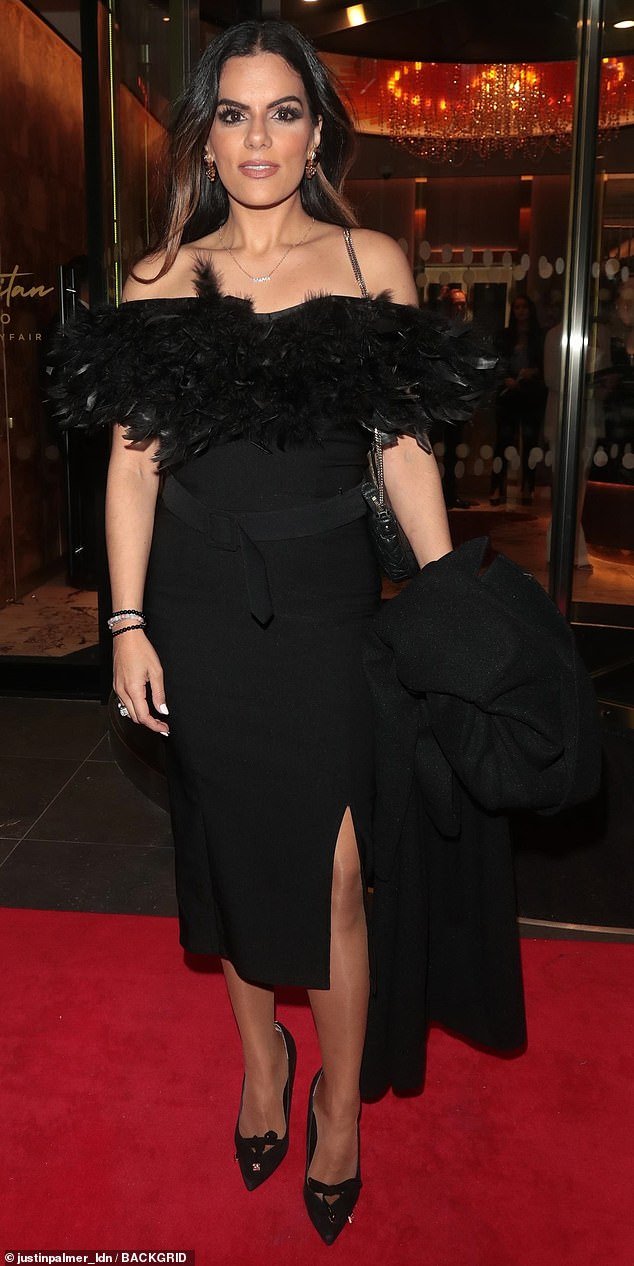 Sensational: A glamorous Neev Spencer arrived at the event in an off-the-shoulder black dress paired with stunning heels.