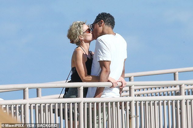 Good Morning America co-hosts Amy Robach and TJ Holmes were spotted packing up the PDA for the first time in public while enjoying a Christmas vacation in Miami.