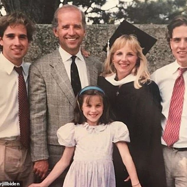 Dr. Biden earned four degrees while raising her family.  She has a bachelor's and two master's degrees, and earned a doctorate in education from the University of Delaware in 2007. she is pictured with Joe and his children.