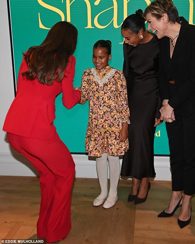 Royalty: Alaia-Mai couldn't help the smile on her face as she greeted the royals alongside her TV star mother