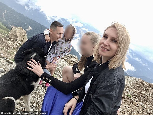 Olesya Ovchinnikova and Alexey Ovchinnikov are pictured on a family holiday