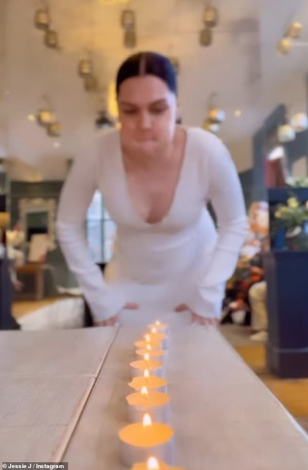 Baby glee: It looked like Jessie was having a blast when she shared a video of her and her party guests struggling to put out a line of tealights with one very cheeky line