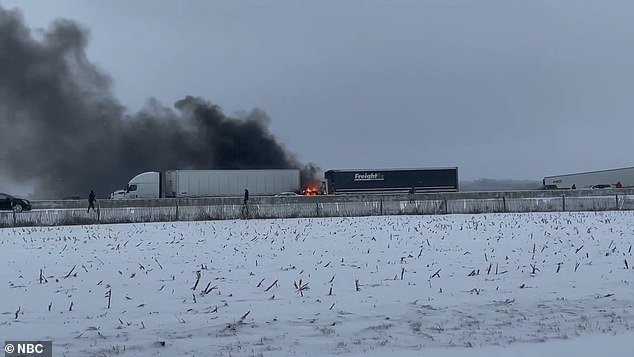Videos show flames erupting from a truck involved in the icy interstate crash