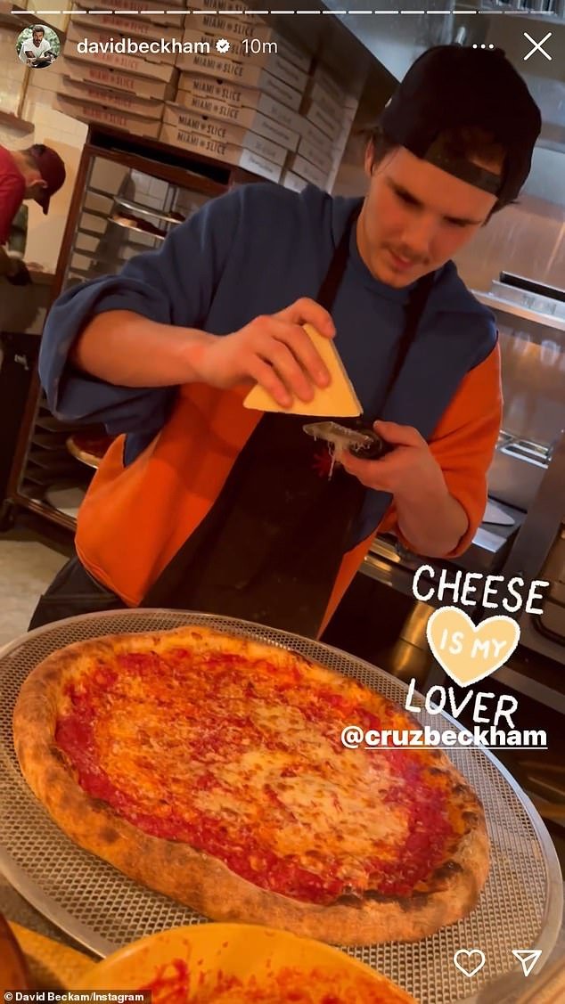 Tutorial: Cruz showed his older brother Brooklyn how to cook while making a pizza at a family outing in Miami on Wednesday night.