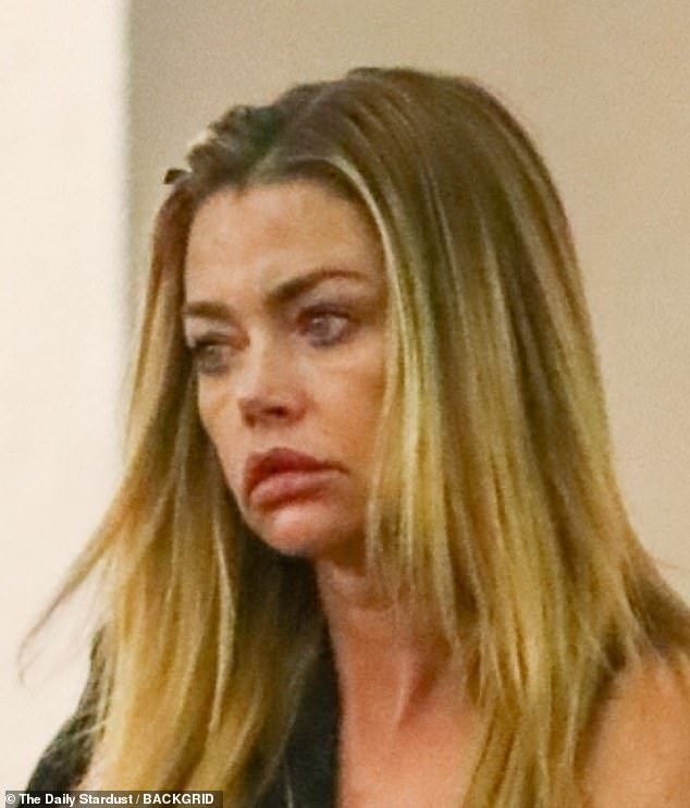 New look: Denise Richards debuted a very plump pout when the glamorous star stepped out in Los Angeles on Wednesday.