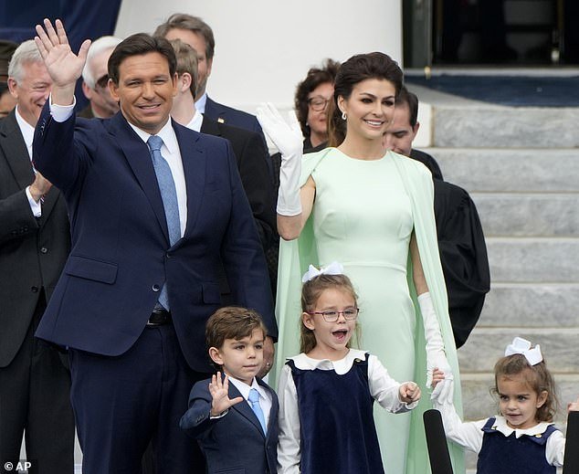 DeSantis (pictured with his family during an opening ceremony this month) has been called a 