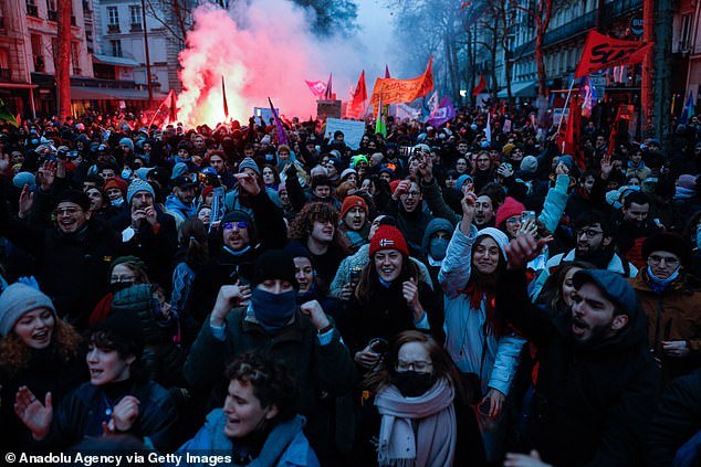 Demonstrators gather to march against pension reform in Paris on January 19