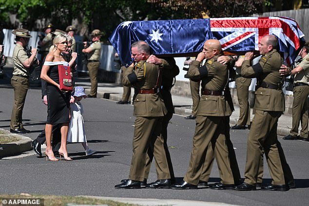 Erin Molan has said an emotional farewell to her 'hero' father Jim Molan at a moving funeral for the senator.