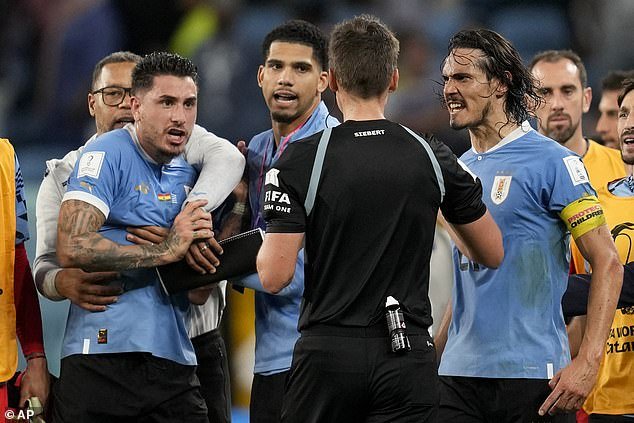 José Giménez, left, and Edinson Cavani, right, were suspended by FIFA for their behavior after Uruguay were knocked out of the World Cup.