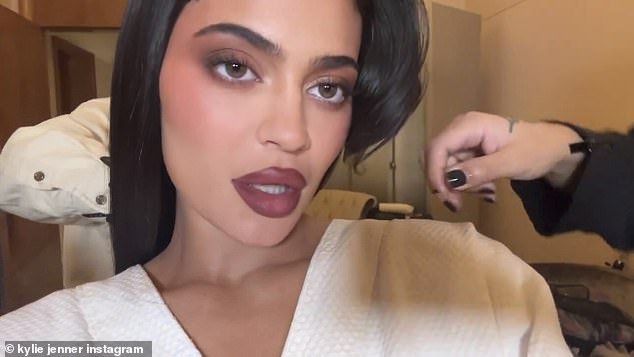 Sultry: Kylie Jenner put on a vampiric display as she posed in gothic makeup for a sultry clip on social media on Tuesday, days after her gaudy lion-head gown caused quite a stir