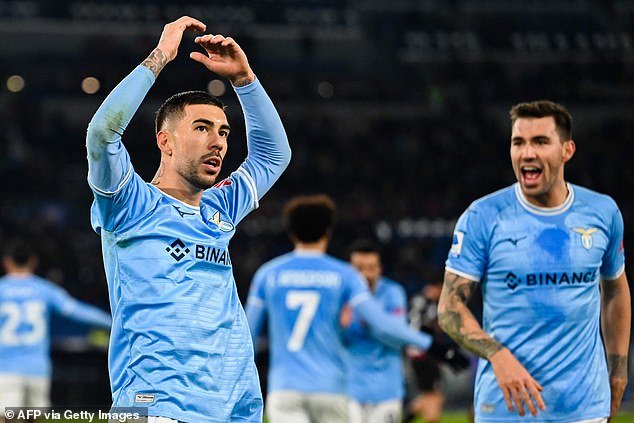 Mattia Zaccagni celebrates after scoring Lazio's second goal of the night against AC Milan.