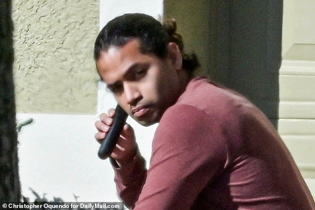DailyMail.com spotted Mario Fernández looking casual and shaving in the front yard of his brother's home in Orlando, Florida on Friday.
