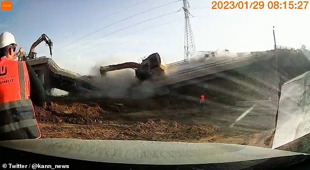 The footage shows the moment two workers were injured during a demolition in Rishon Lezion as two Caterpillar machine went crashing to the ground