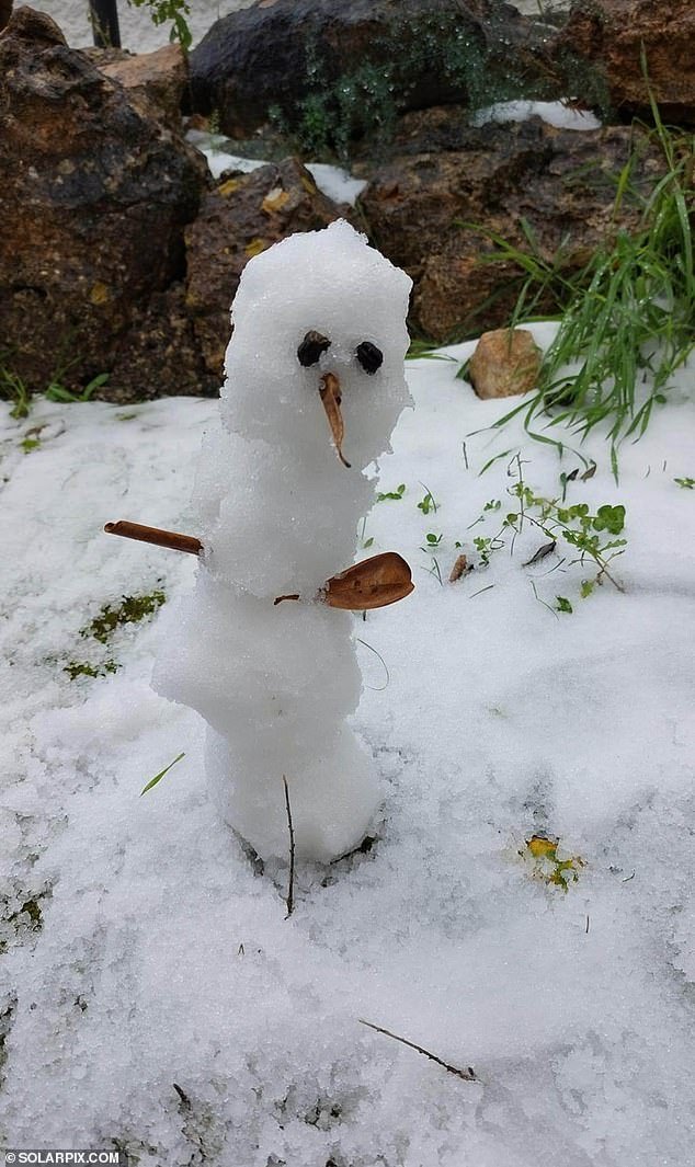Residents in Ibiza built a snowman as they enjoyed the usually frosty weather on the Spanish island