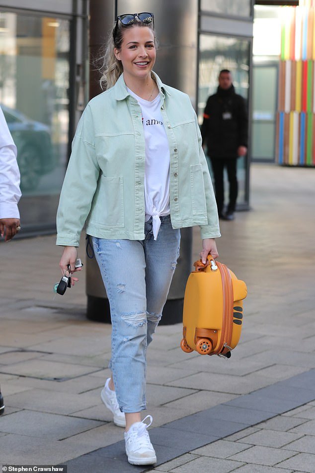 Here it comes: Gemma Atkinson had a spring in her step as she walked out of a Leeds television studio on Tuesday, just over a week after announcing her second pregnancy.