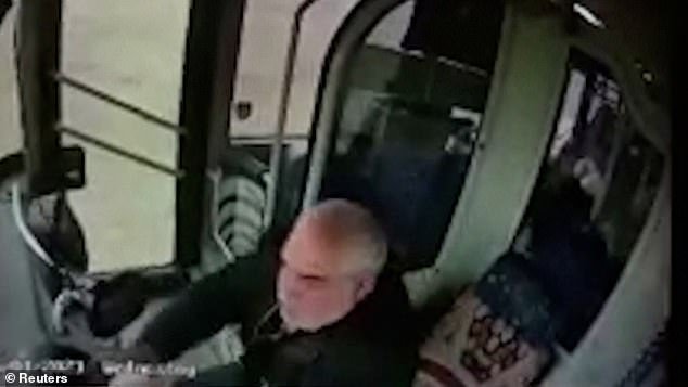 CCTV from onboard a bus captured the dramatic moment the driver lost control of his steering wheel as the vehicle plunged into a lake