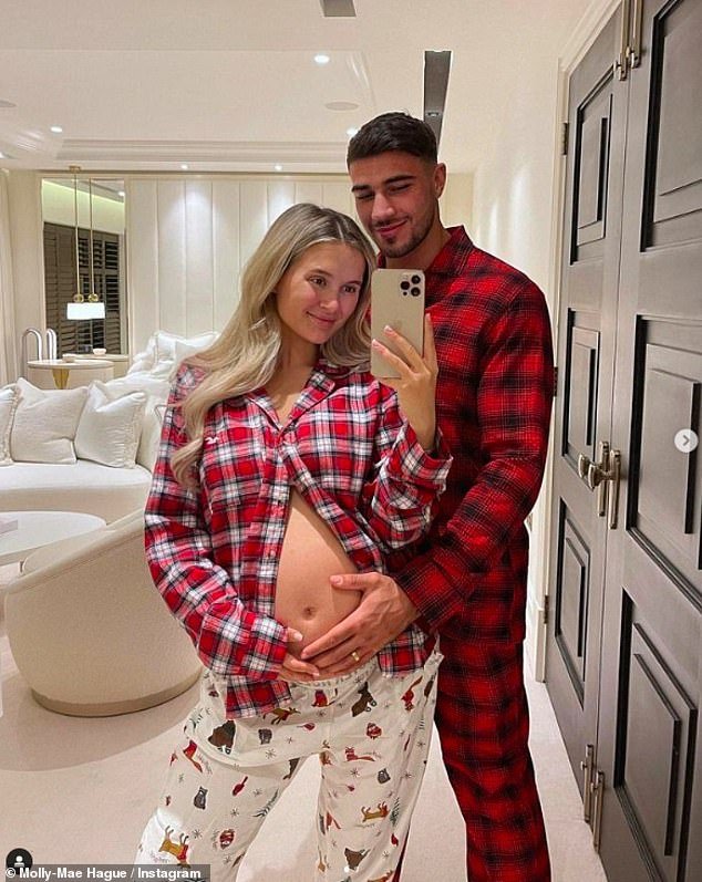 Could be?  Tommy Fury has dropped a big hint that his girlfriend Molly-Mae Hague has already given birth (pictured together in December)