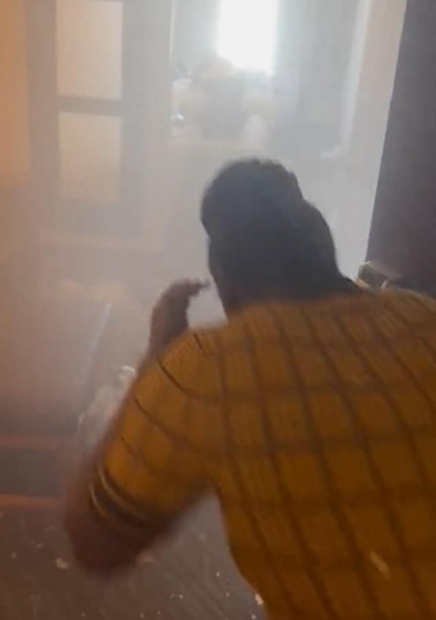 Dramatic videos showed people running in and out of the soaked hotel room