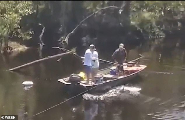 Brotz and his fellow paddlers, Darren Field and Carson Gore, took four hours to restrain the gator, which eventually weighed in at 920 pounds and 13 and three and three quarter inches.