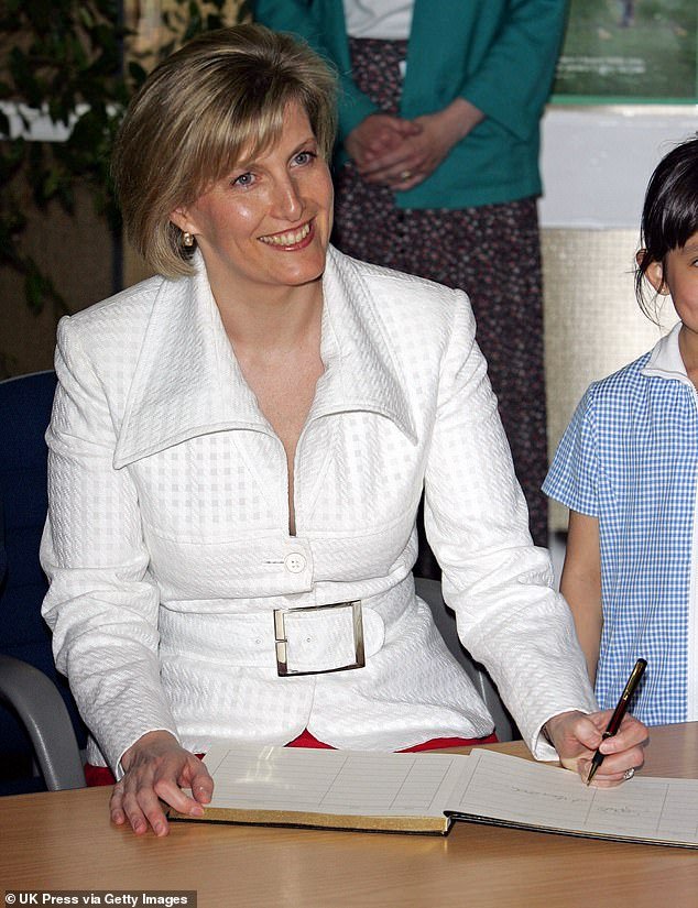The mother of two signed a book with her left hand for The National Literacy Trust at St Ethelbert's Catholic Primary School, Slough, in 2006
